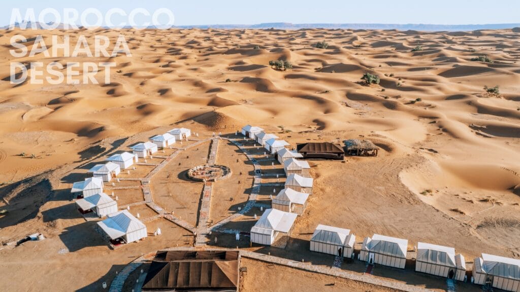 a panoramic view of Luxury desert camp in sahara desert during 7-Day Marrakech Desert Trip to Fes or Casablanca; marrakech desert trip guide